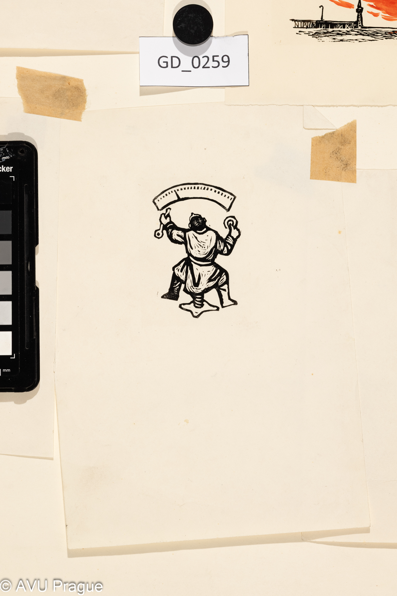 ilustrace - sedíci muž ze zadu